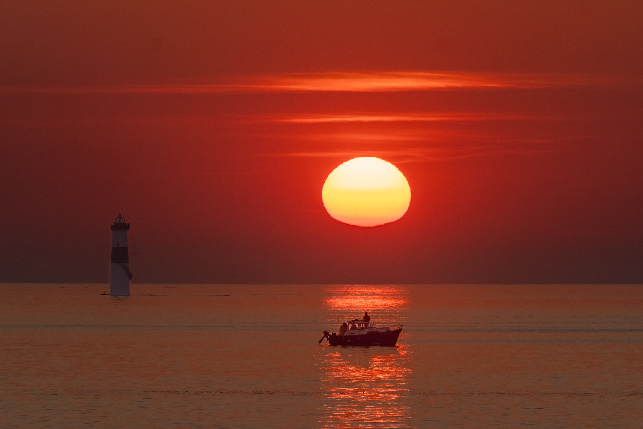 Panoramic view of the Sligo coastline at sunset, representing the local landscape.